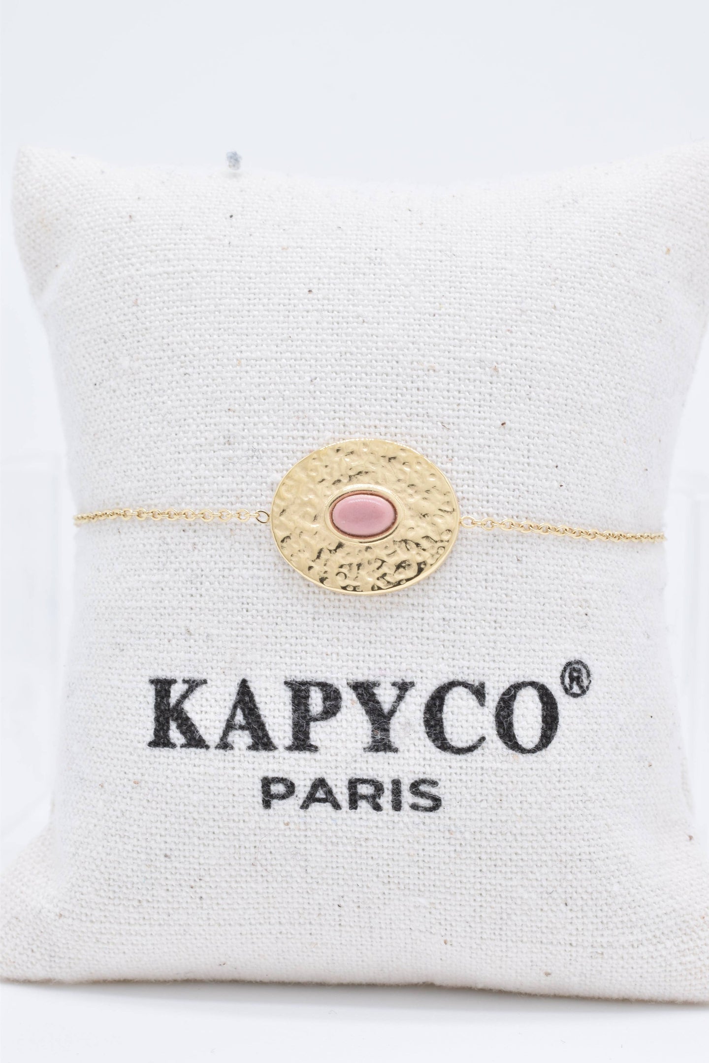 Delicate gold tone bracelet with natural stone